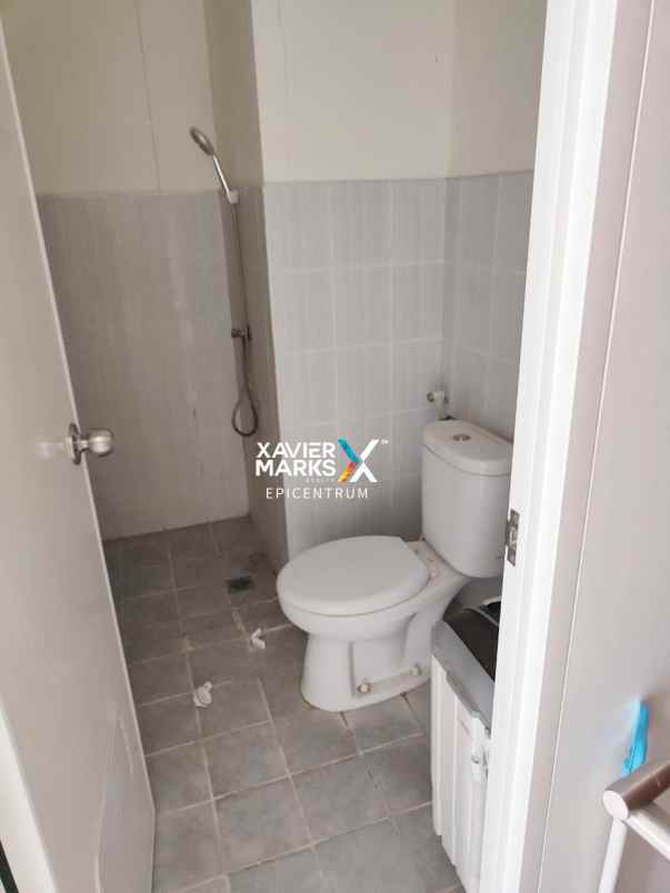 dijual apartemen puncak dharmahusada tower b kosongan
