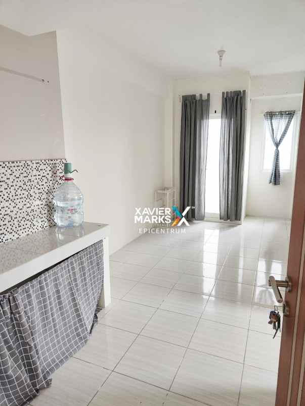 dijual apartemen puncak dharmahusada tower b kosongan
