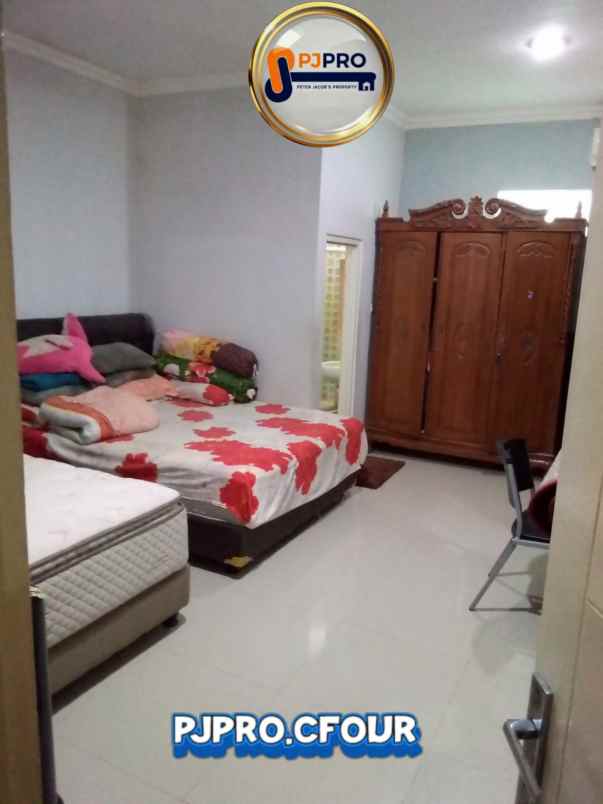 dijual rumah cluster alamanda harapan indah