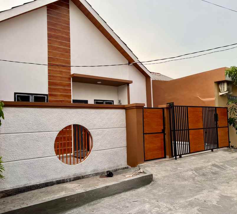 dijual rumah harapan indah
