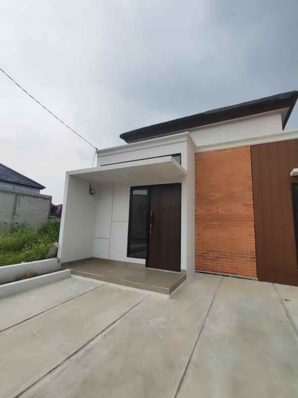 dijual rumah jln raya tapos depok
