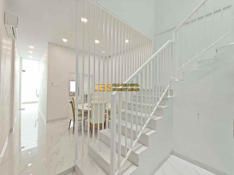 dijual rumah komplek adam malik