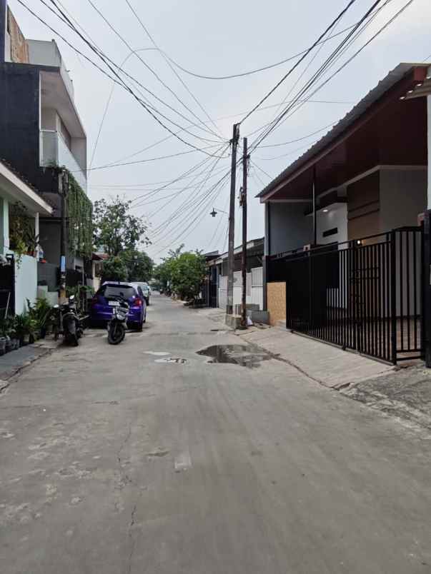 dijual rumah pesona anggrek harapan bekasi
