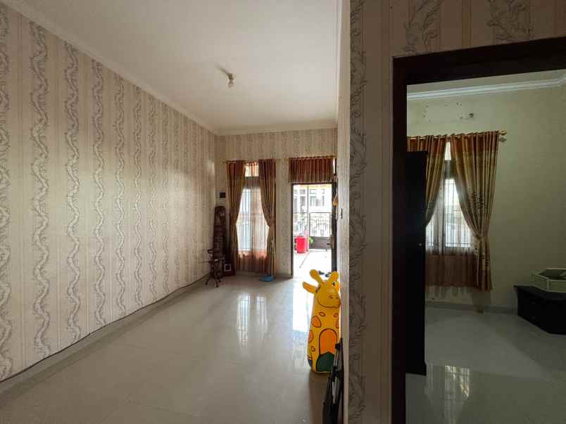 dijual rumah ratu jaya