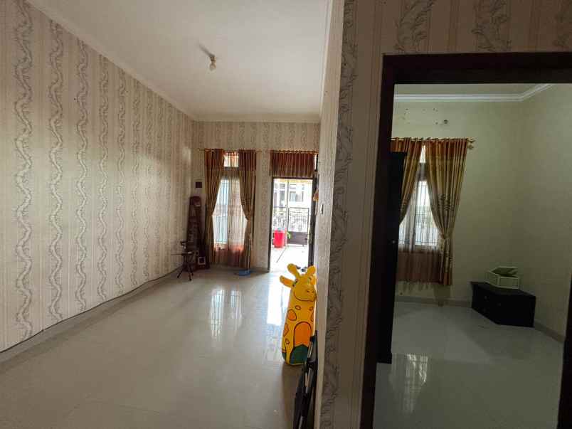 dijual rumah ratu jaya