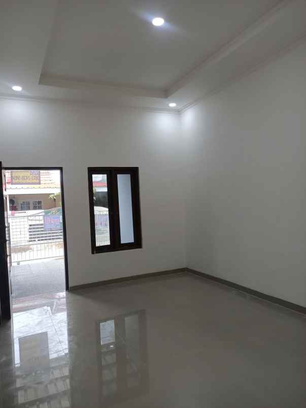 dijual rumah taman harapan baru