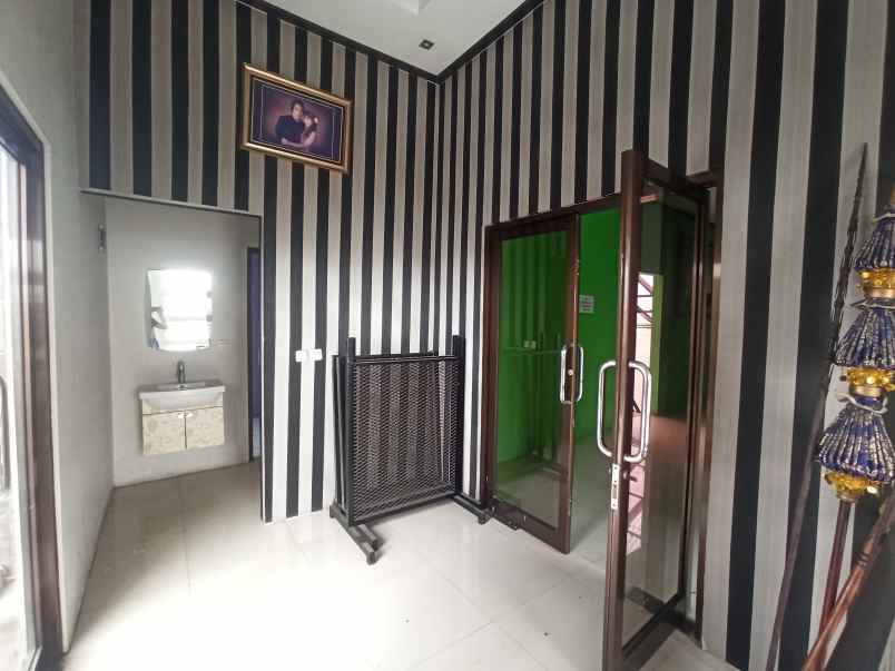 dijual rumah taman kopo indah