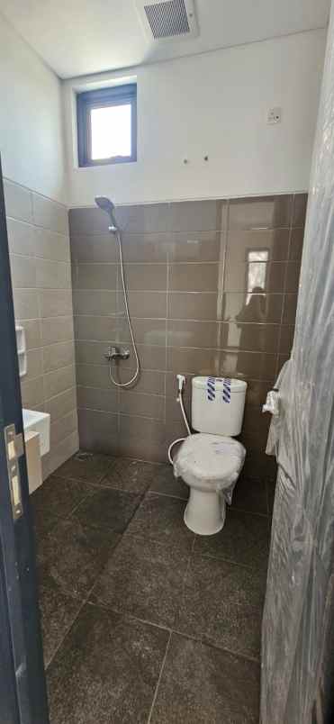 disewakan rumah cluster harapan indah