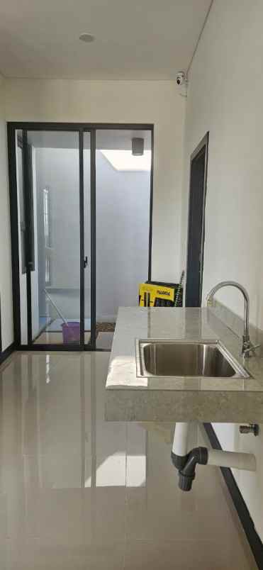 disewakan rumah cluster harapan indah