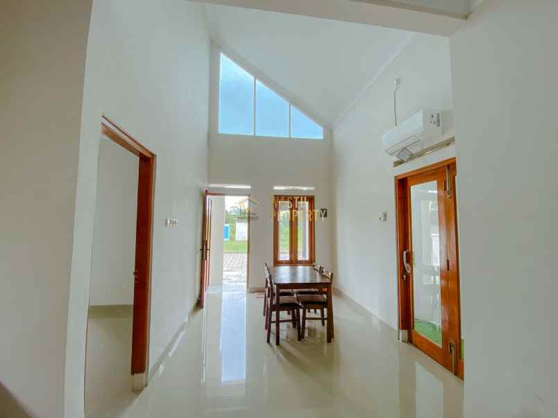 hunian rooftop stylish dengan carport dan smart lock