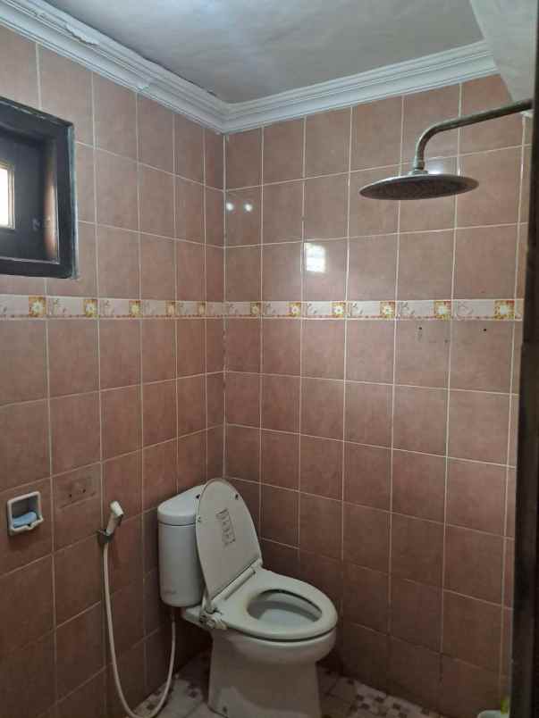 rumah 2 lantai dalam perumahan di palagan km 9