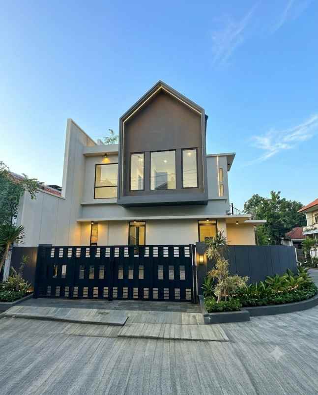 rumah babatan pantai strategis row 3 mobil carport 2