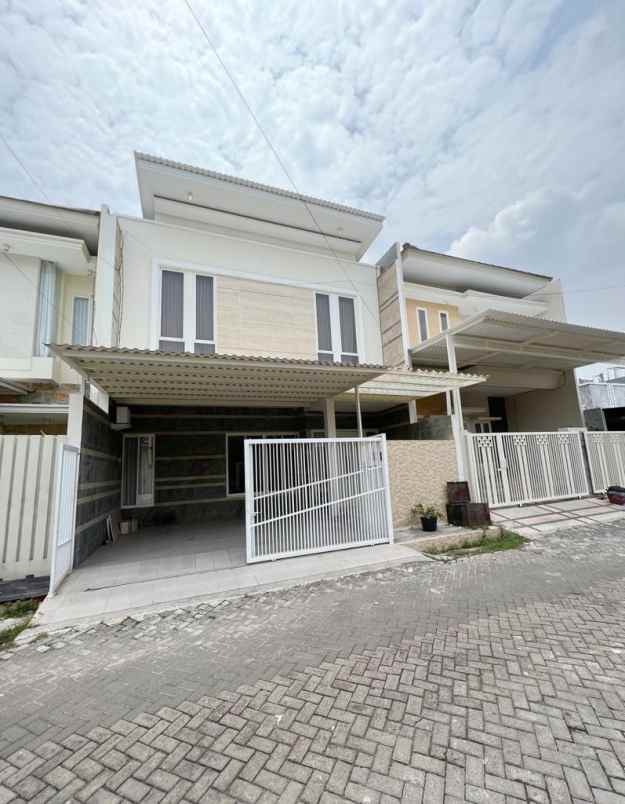 rumah modern minimalis lokasi sutorejo surabaya