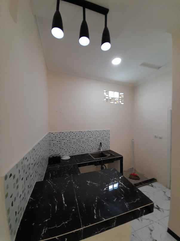 rumah one gate akses motor harga 250 jt 275 jutaan