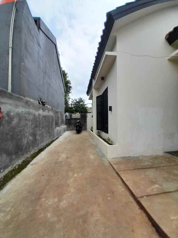 rumah one gate akses motor harga 250 jt 275 jutaan