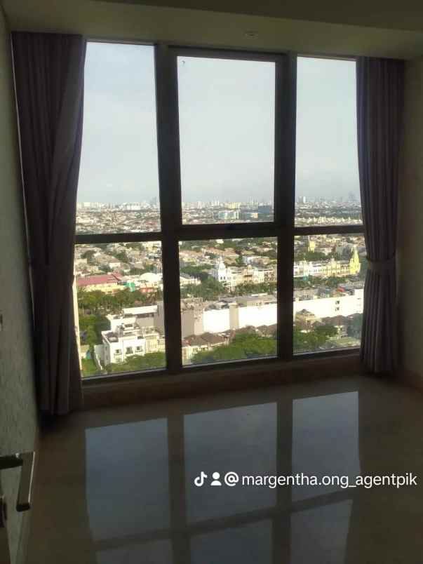 apartemen gold coast pik view city and mangrove