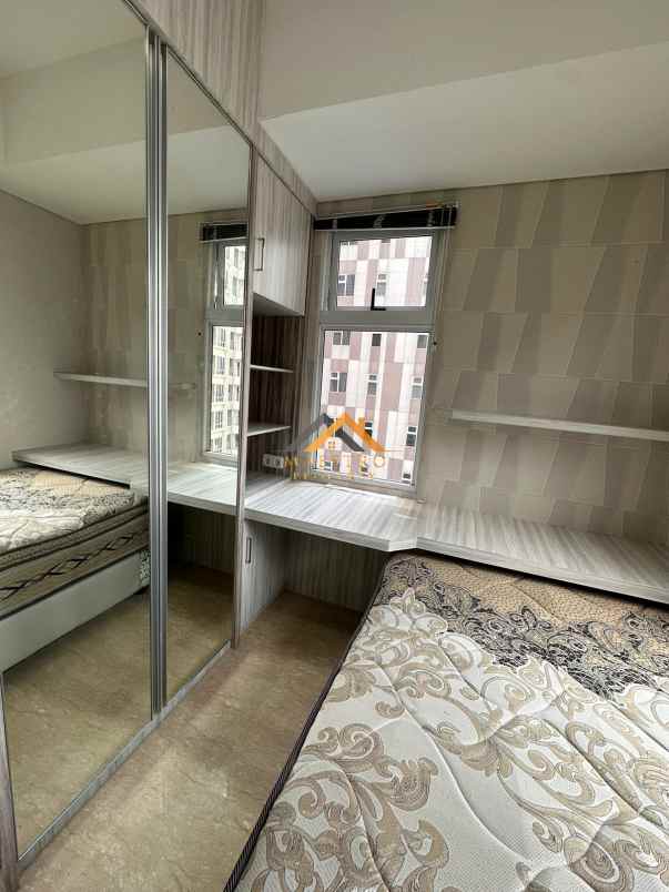 dijual apartemen podomoro city deli tower