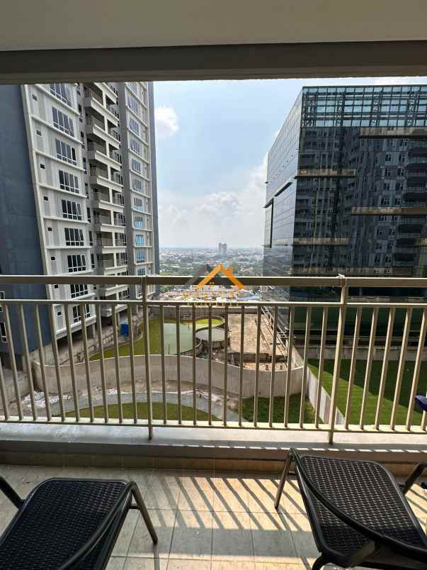 dijual apartemen podomoro city deli tower