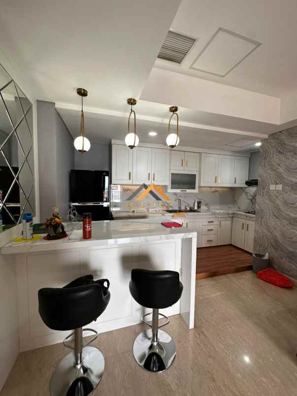 dijual apartemen podomoro city deli tower