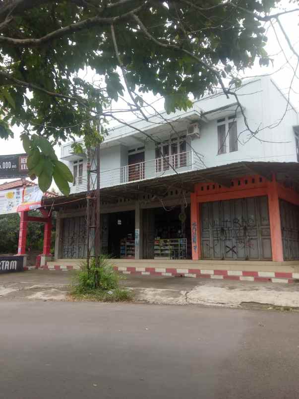 dijual bangunan toko matrial dan rumah