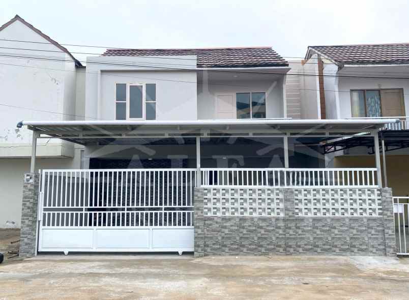 dijual rumah jalan purnama agung 7