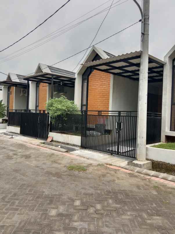 dijual rumah jalan raya telang timur