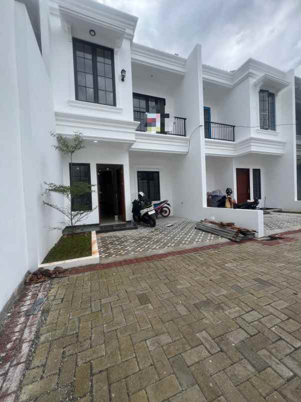dijual rumah jl pasar kecapi pondok