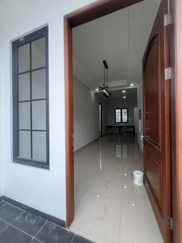dijual rumah jl pasar kecapi pondok