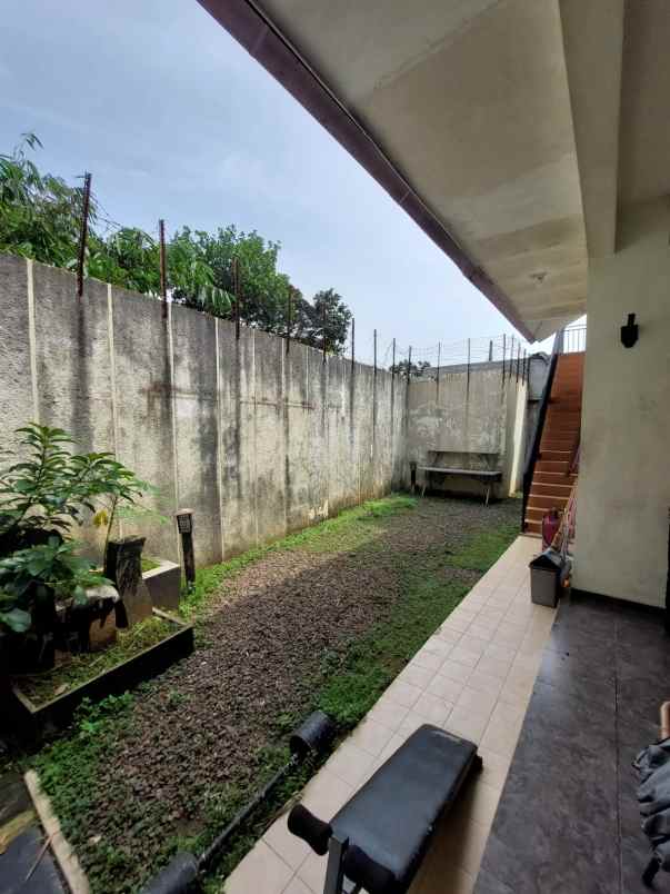 dijual rumah jln raya kalimulya