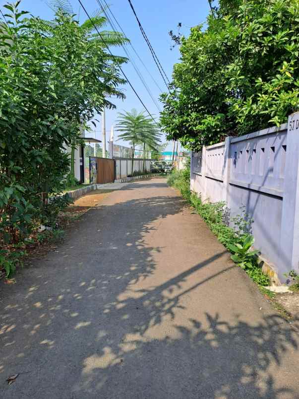 dijual rumah jln raya kalimulya