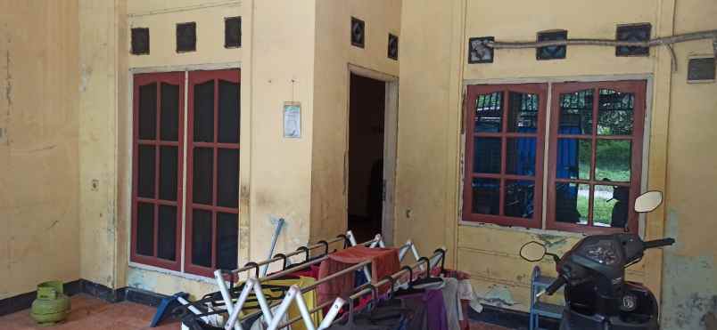 dijual rumah jln raya kedaung barat