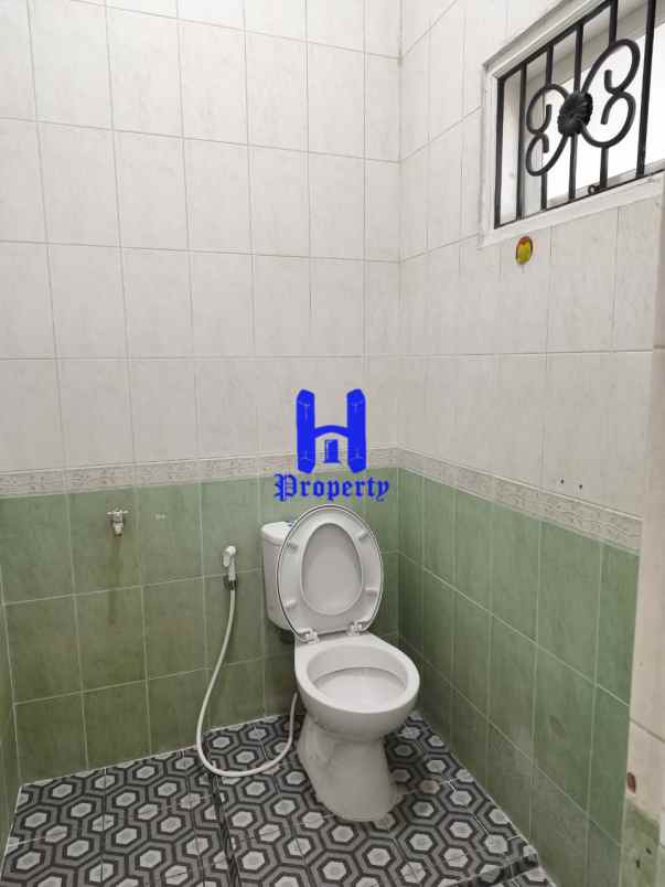 dijual rumah komplek cemara hijau jalan