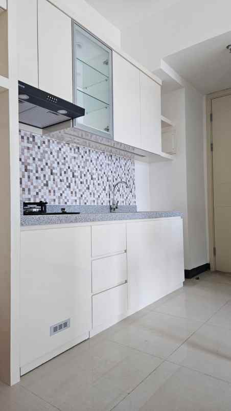 dijual rumah pakuwon city amor