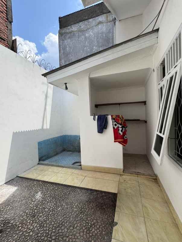 dijual rumah taman bumyagara mustikajaya