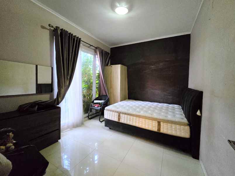 disewakan rumah cluster palm spring jgc