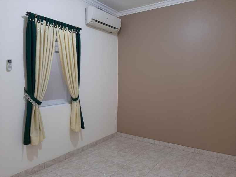 jual rumah siap huni raffles hills cibubur