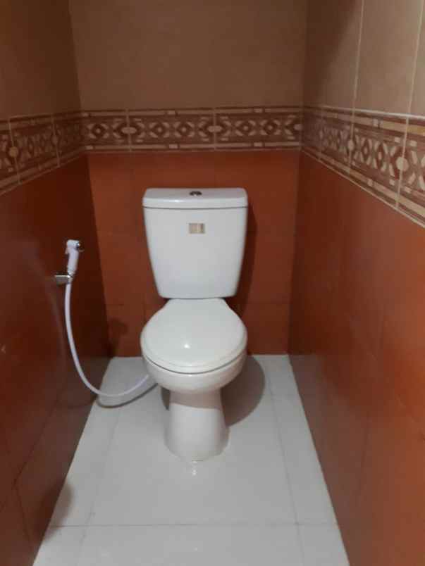 jual rumah siap huni raffles hills cibubur