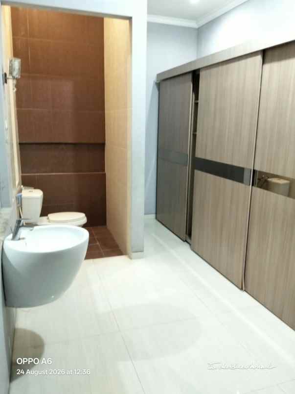 rumah graha family surabaya barat