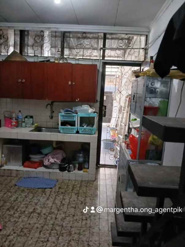 rumah green garden jakbar shm