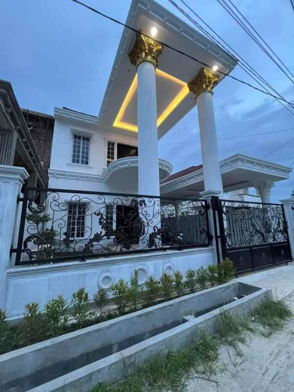 rumah megah 2 lantai di jalan soekarno hatta pekanbaru