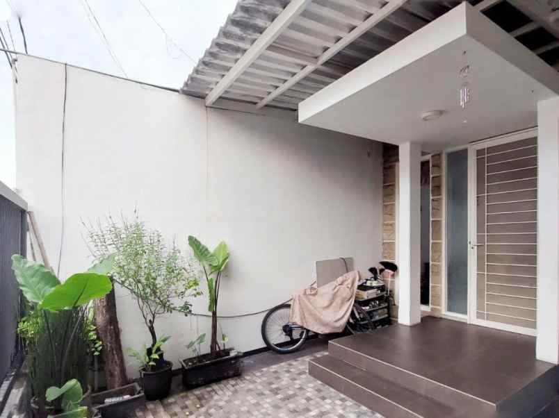 rumah pantai mentari minimalis row 3 mobil