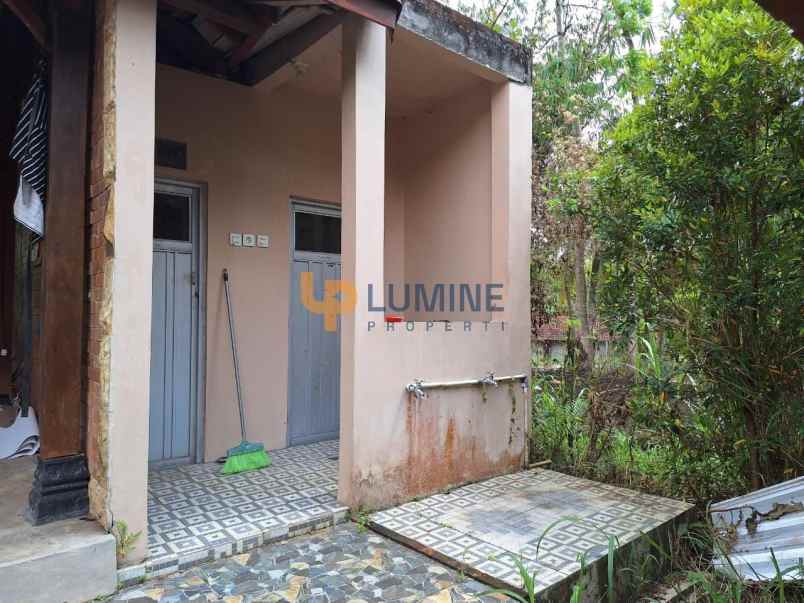 rumah semi villa joglo dengan kolam renang