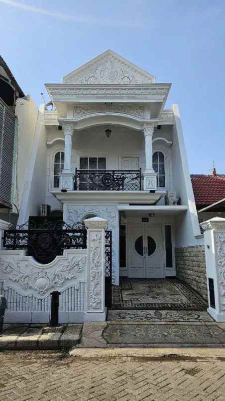 rumah taman mutiara strategis semi furnish siap huni