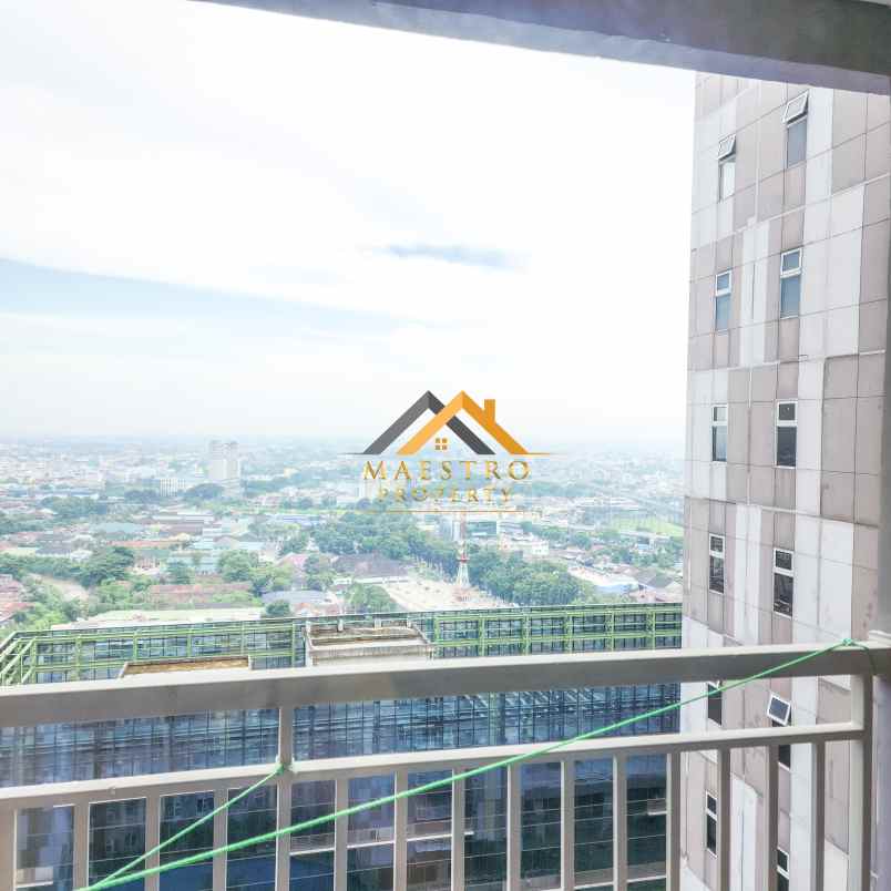 dijual apartemen podomoro city deli tower