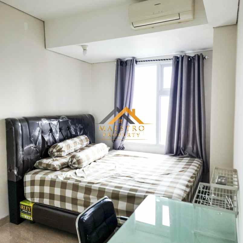 dijual apartemen podomoro city deli tower