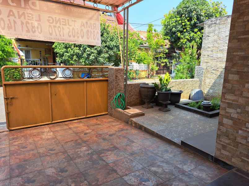 dijual rumah asri di boulevard harapan indah bekasi