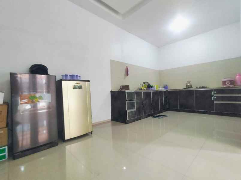 dijual rumah cluster greenwood golden