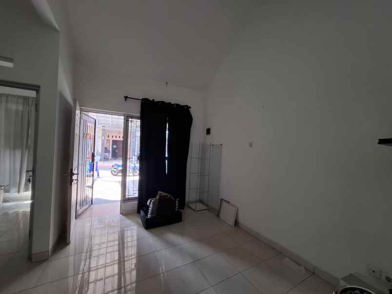 dijual rumah cluster harapan indah