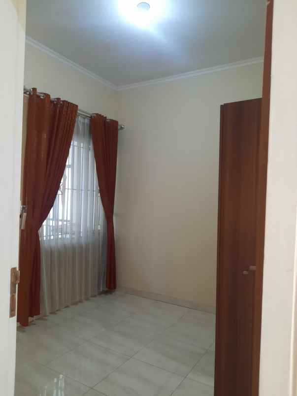 dijual rumah cluster kamayangan