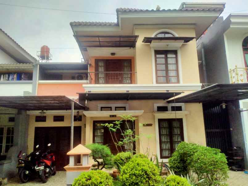 dijual rumah cluster taman tjikini